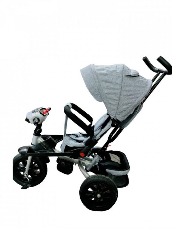 Tricicleta pentru copii Novokids Super Trike Albastru Jeans cu copertina, melodii si lumini, roti din cauciuc, pozitie somn, scaun reversibil cu rotatie 360 grade